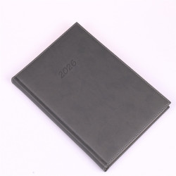 Határidőnapló Bolero B/5, napi krémszínű lapokkal szürke Realsystem 2026. Határidőnapló Realsystem