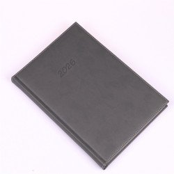 Határidőnapló Bolero B/5, napi krémszínű lapokkal szürke Realsystem 2026. Határidőnapló Realsystem